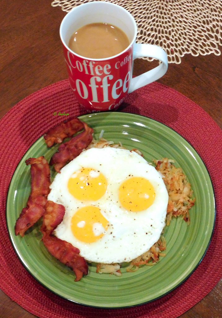 Bacon Hash browns Sunny Side Up Eggs Breakfast with coffee